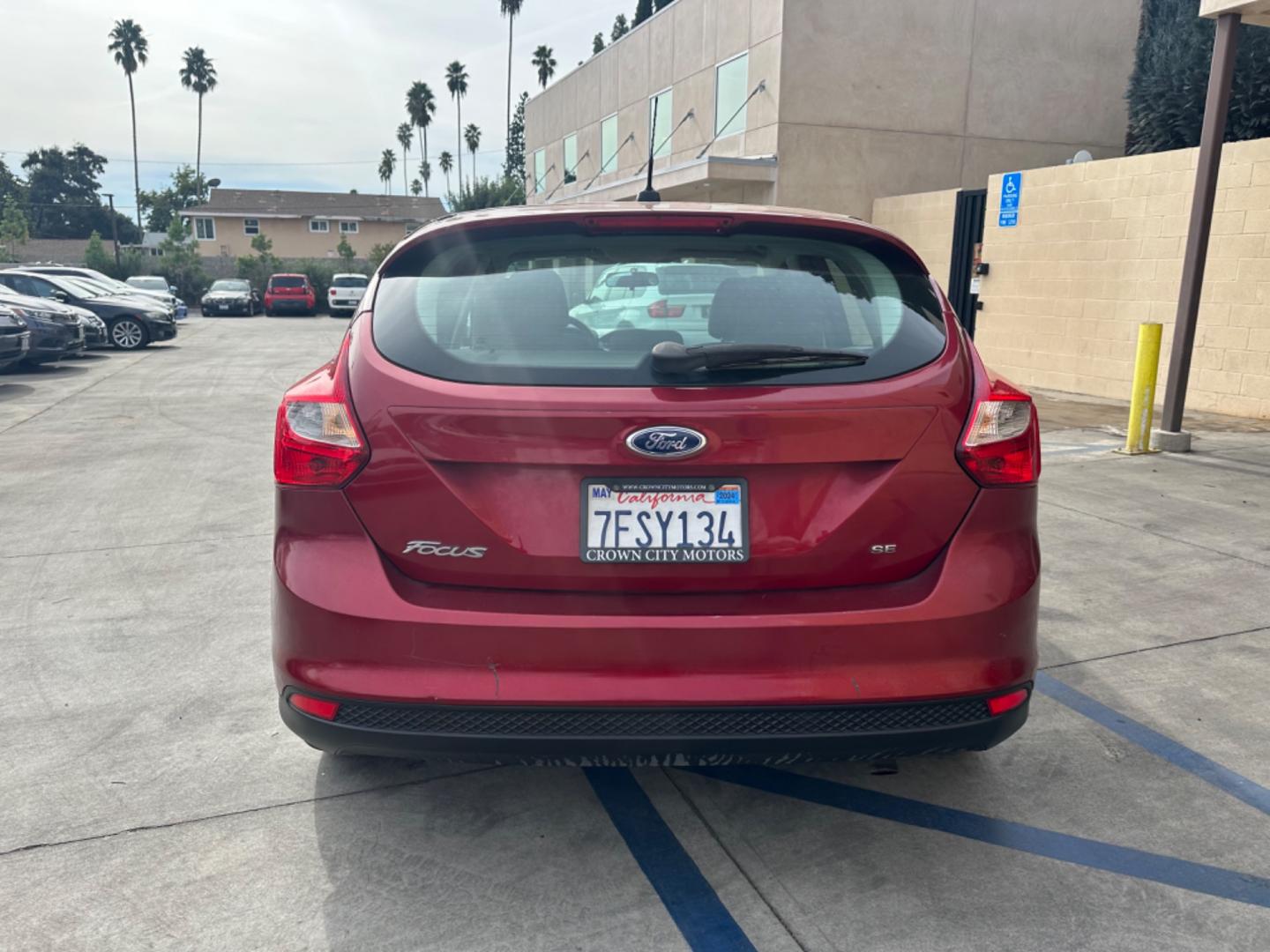 2014 RED /Gray Ford Focus Cloth (1FADP3K24EL) with an 4 Cylinders engine, Automatic transmission, located at 30 S. Berkeley Avenue, Pasadena, CA, 91107, (626) 248-7567, 34.145447, -118.109398 - Good Value! Good MPG! - Photo#3